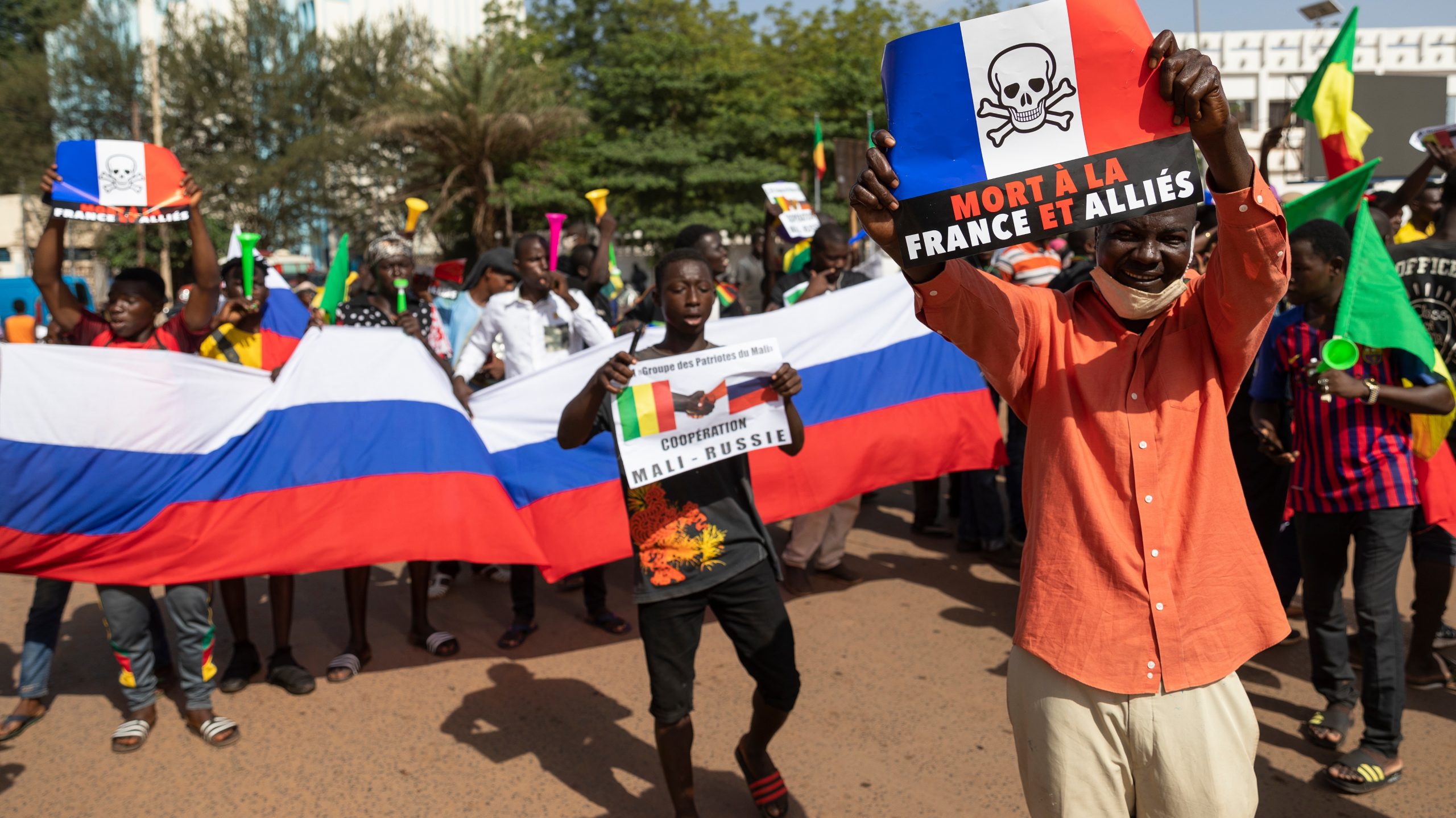 @malians celebrating with Russian flag